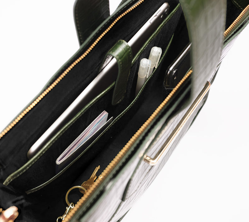Interior of a green full leather crossbody handbag
